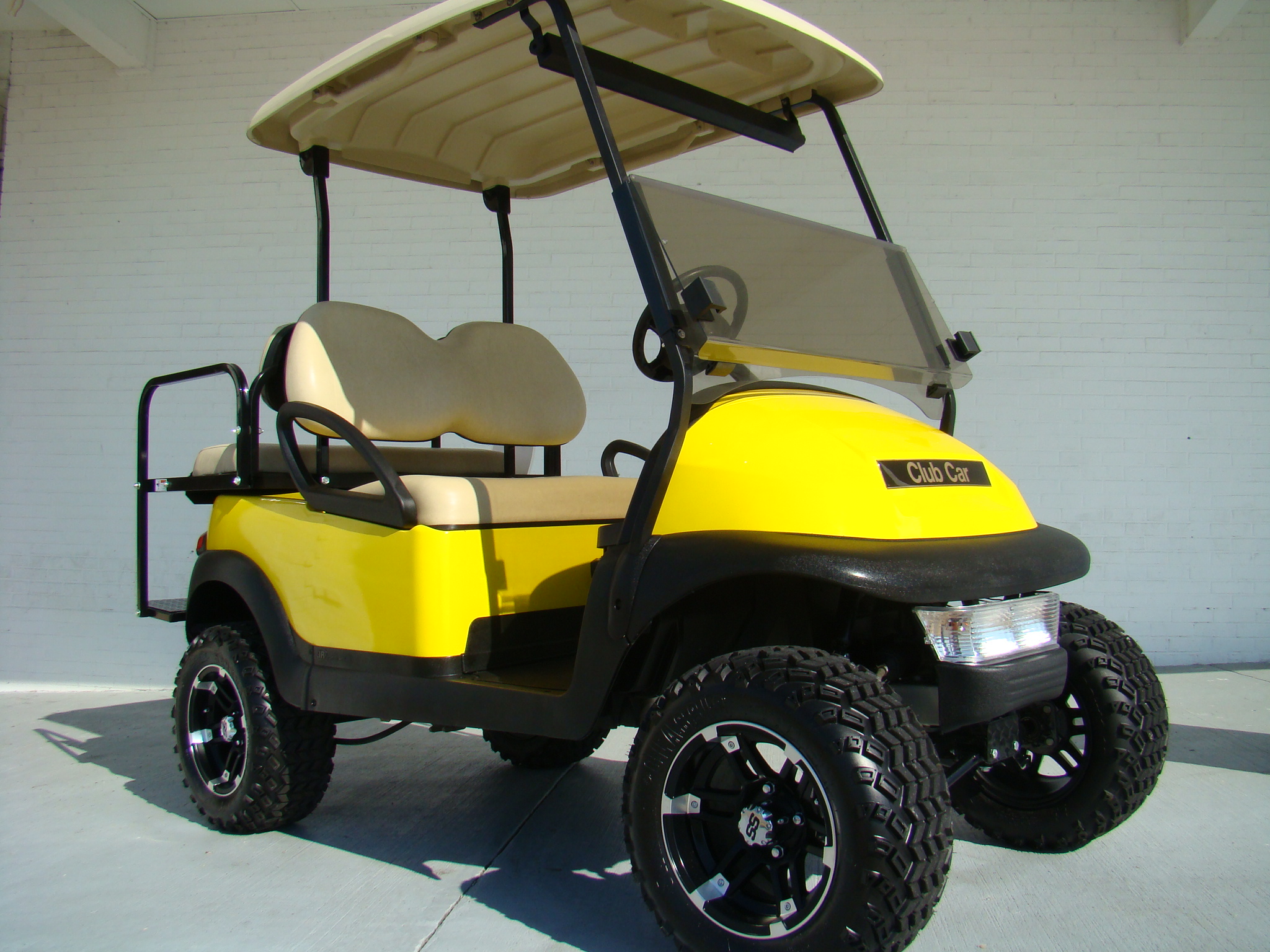 Yellow Lifted Precedent Golf Cart